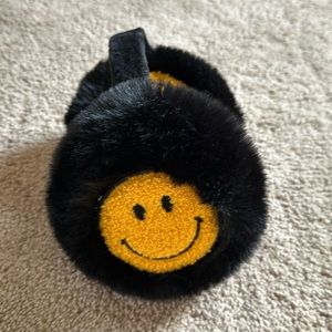 Brand new with tags Steve Madden Happy Face ear muffs